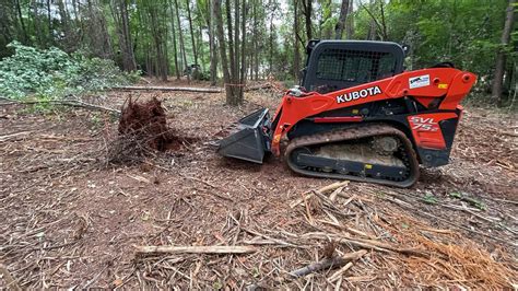 kubota skid steer clearing land|Clearing lot for a new home with a Kubota Skid Steer! .